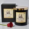 Femme Fatale soy wax candle with gold lid and matching packaging on a white background