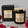 Soy wax candle labeled 'Hekate' with black box and red roses on a gray background