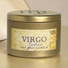 A metallic gold tin candle labeled 'Virgo Zodiac Soy Wax Candle' by Victoria's Gardens, set against a neutral beige background.